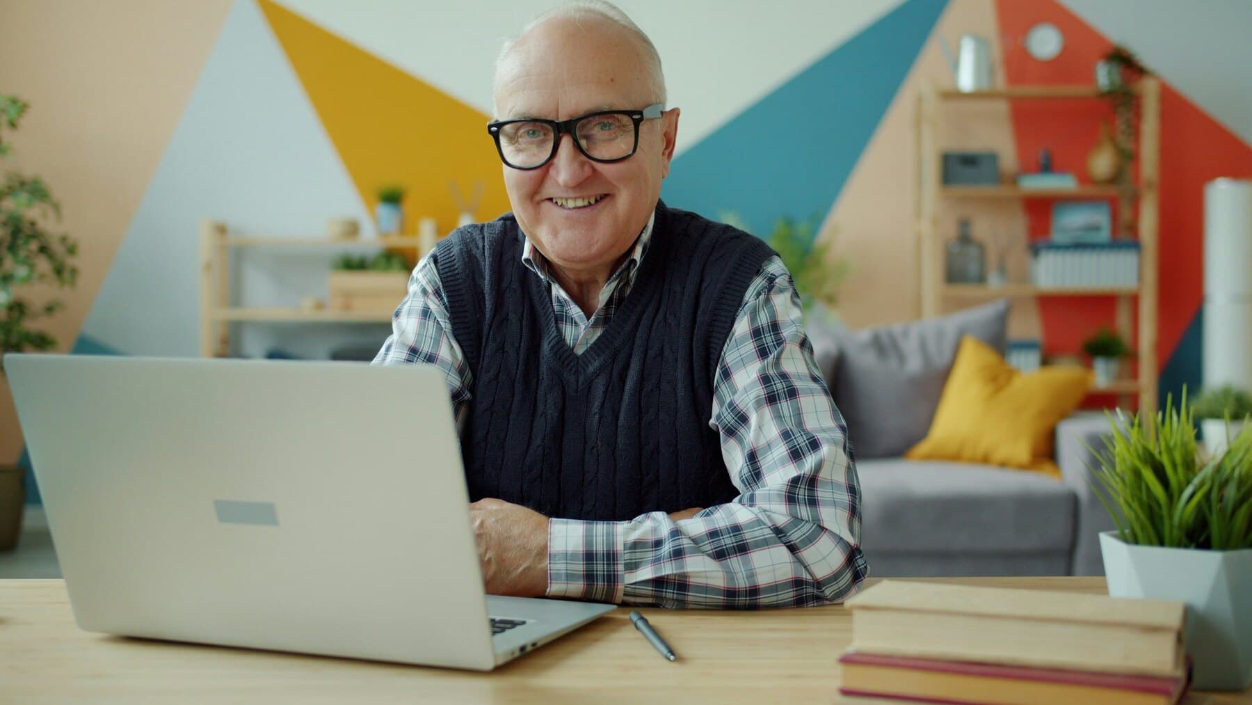 Agency owner using a laptop at home